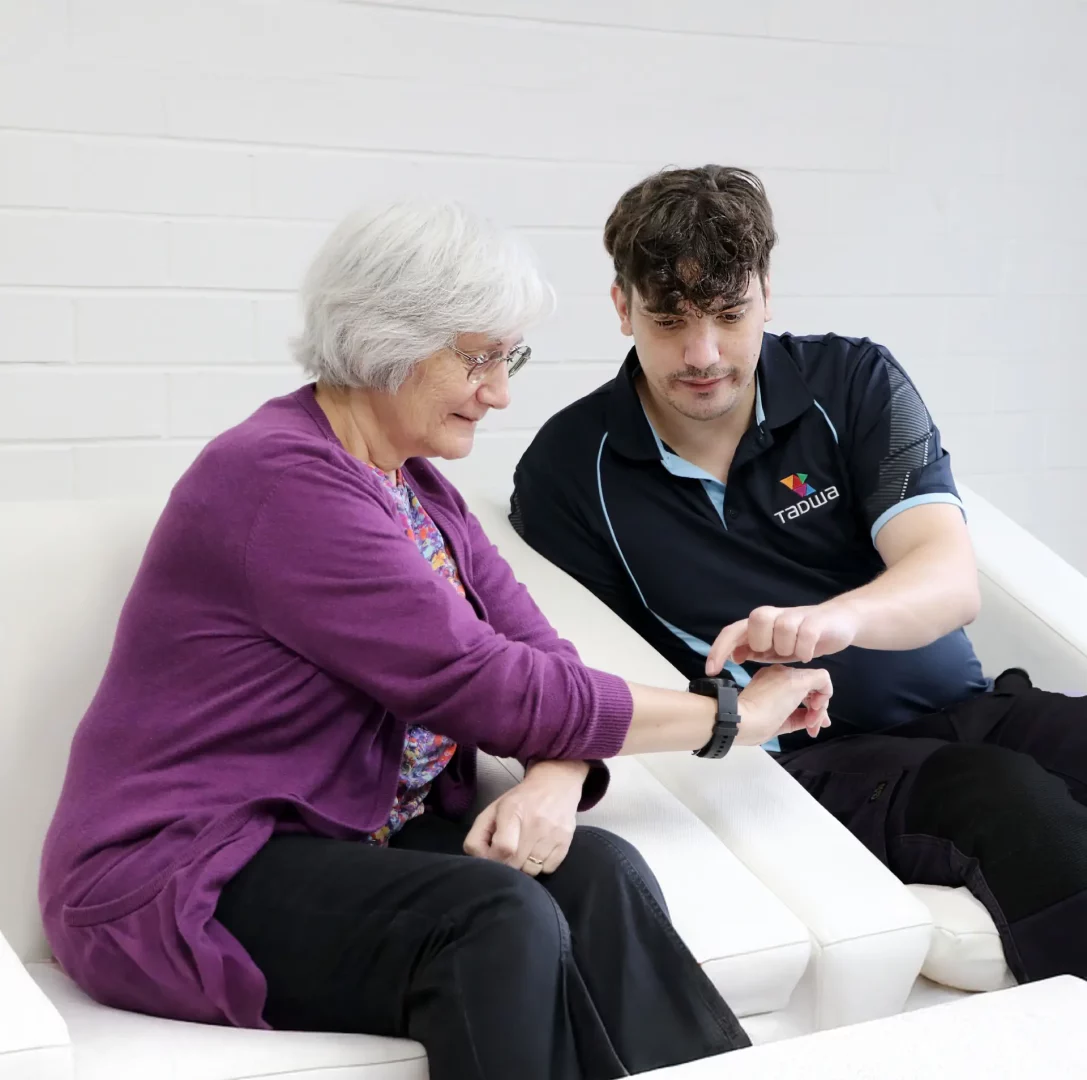 young person showing senior new device